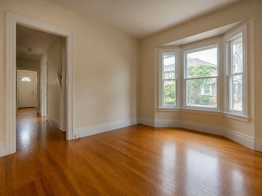 An attached house interior in Queens with an oak floor
